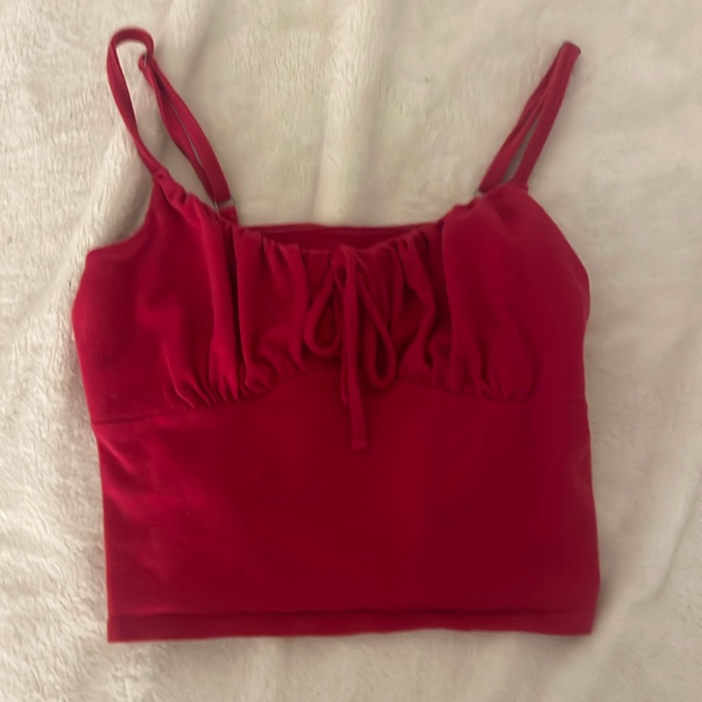 red hollister top with tie and scrunch in the front